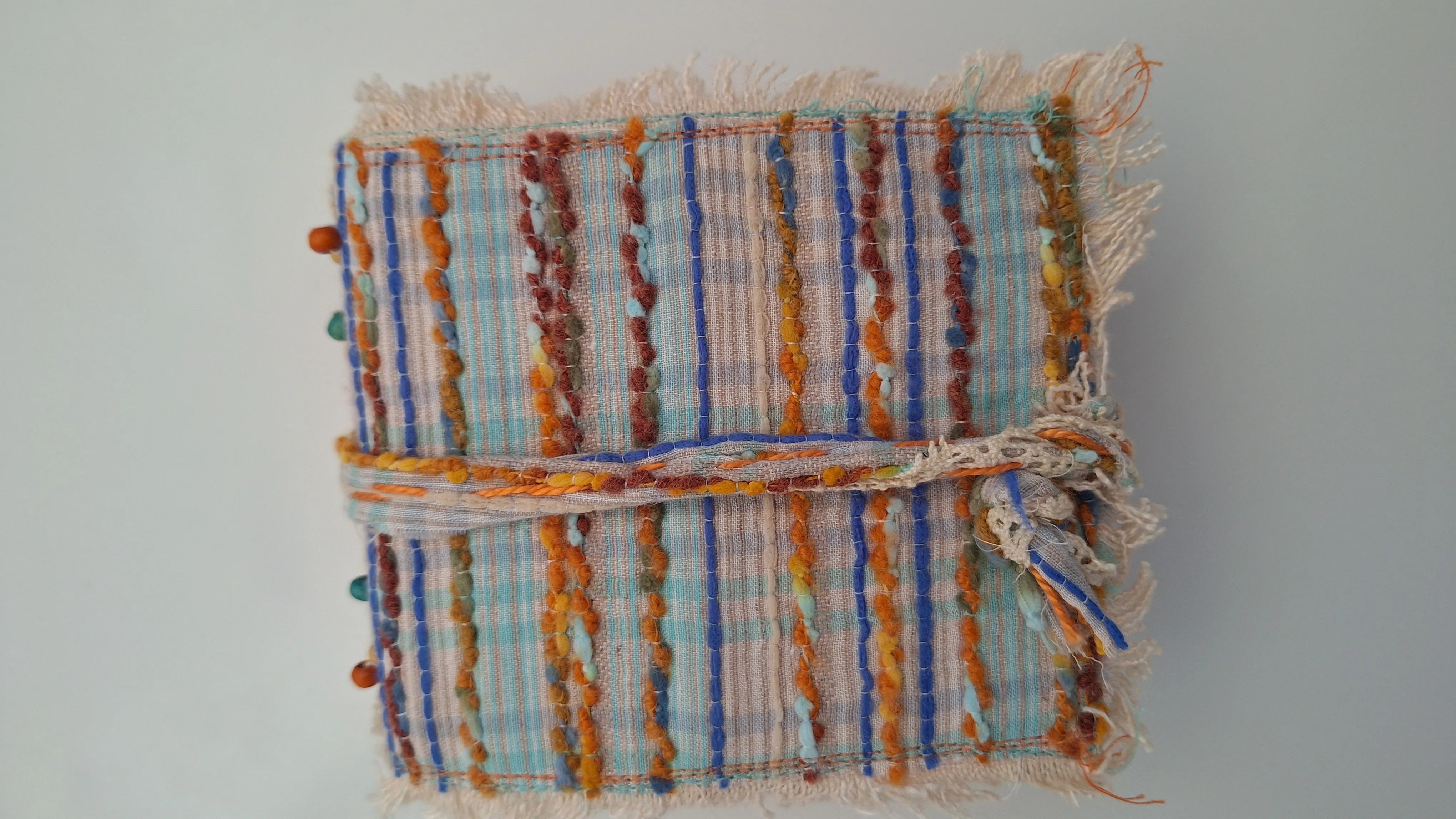 Bundelboek met stoffen omslag en lintsluiting